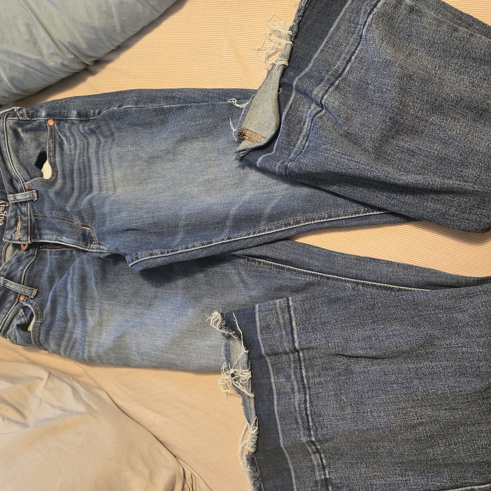 Distressed Blue Jeans